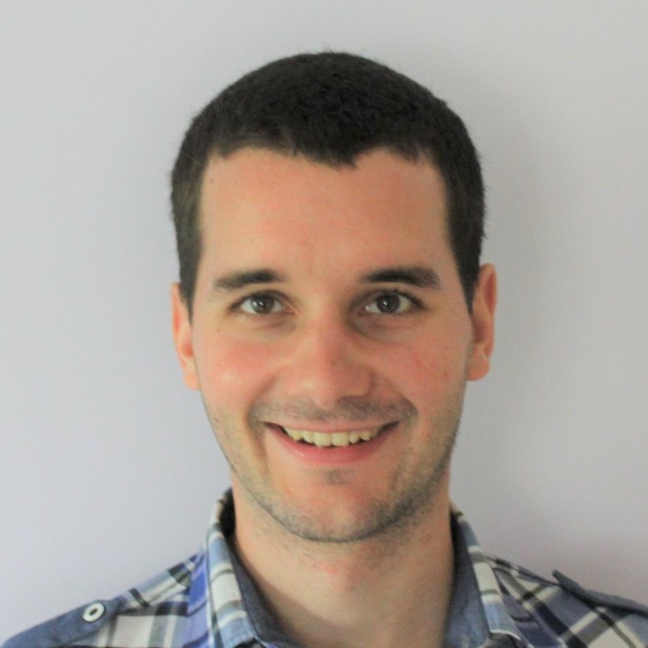 Photo, headshot, of Balazs Wagner, against a grey background.